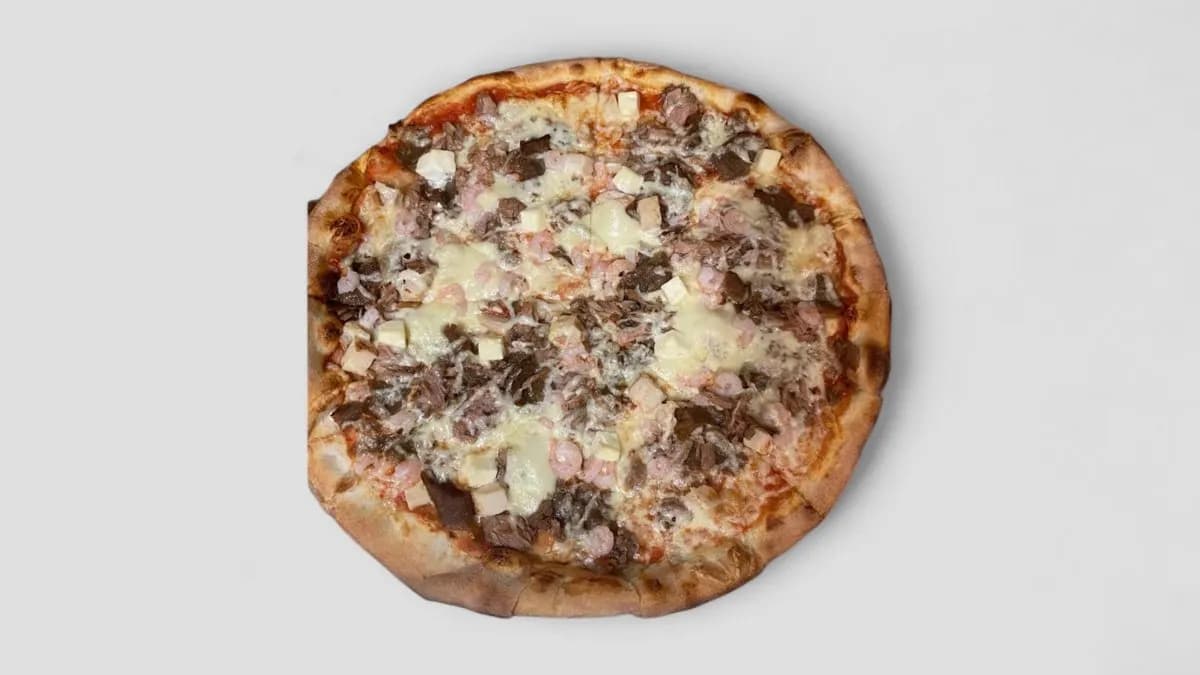 21. Oma valinta 4 täytettä perhepizza