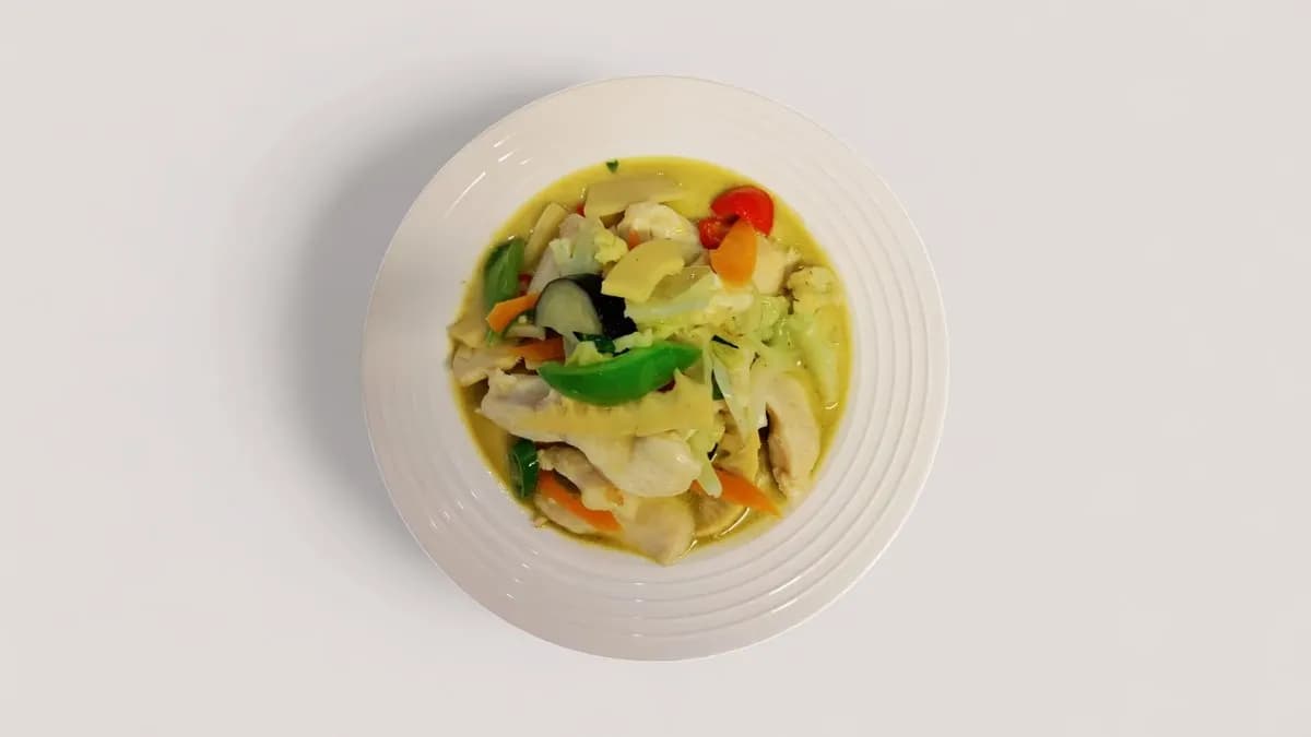 T32. Kanaa vihreässä currykastikkeessa