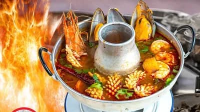 64. Tom yum talay moh fai
